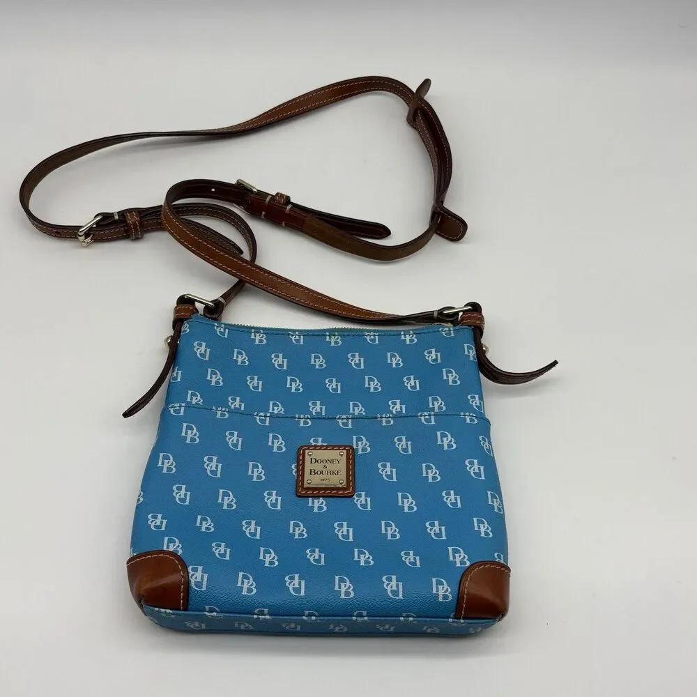 Dooney & Bourke Blue Logo Crossbody Bag Zip Top Adjustable Strap Lined Pockets